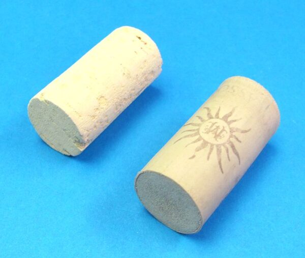 pair of hollow corks for coin in bottle trick #3