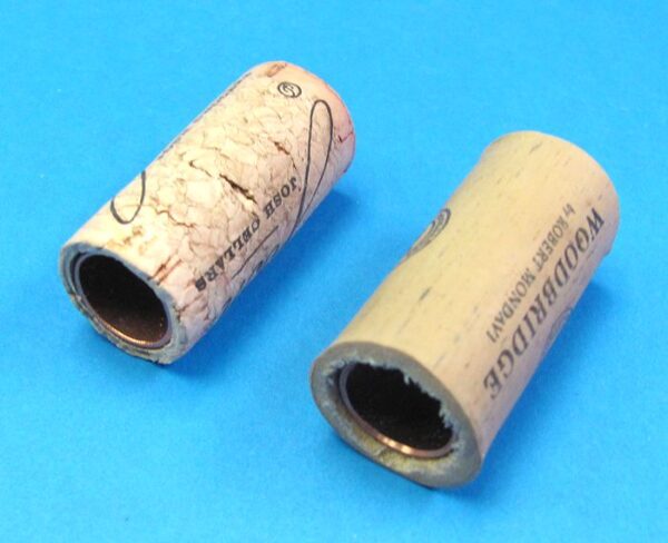 pair of hollow corks for coin in bottle trick #4 2