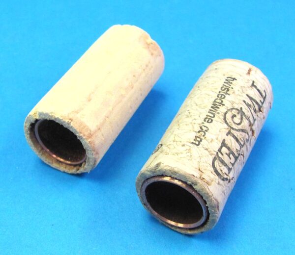 pair of hollow corks for coin in bottle trick #5 2