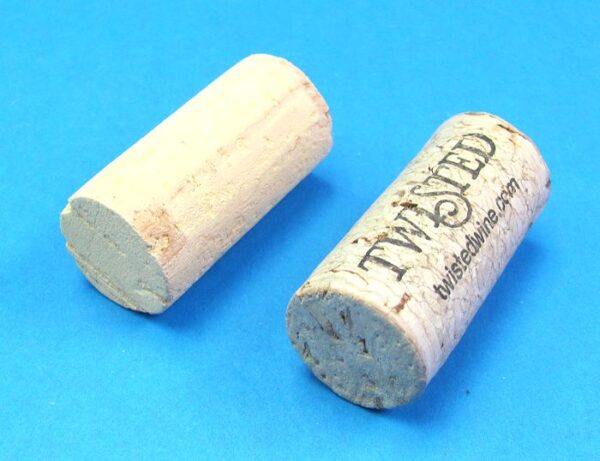 pair of hollow corks for coin in bottle trick #5