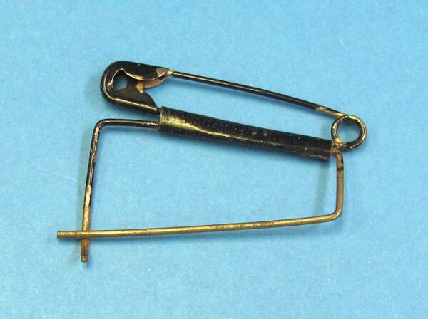 metal pin type body holder (unknown use)