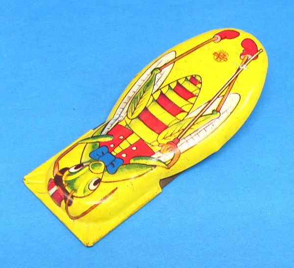 vintage tin grasshopper noisemaker toy (u. s. metal toy mfg. co.)