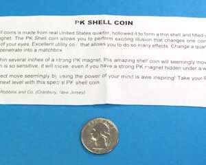 shell coin with magnet (pk) quarter (heads)