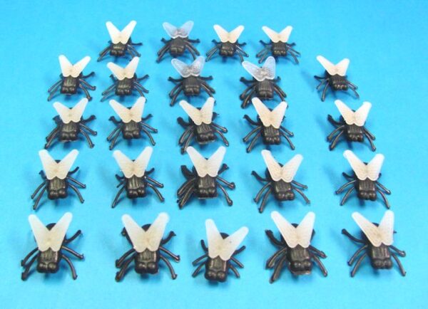 a lot of 24 large plastic flies novelties/jokes