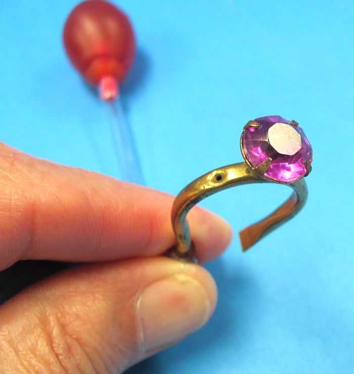 vintage squirt ring (rose colored gem)