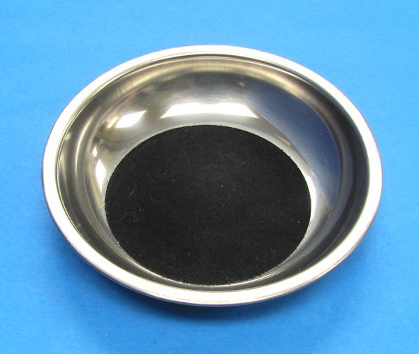 coin through glass tray