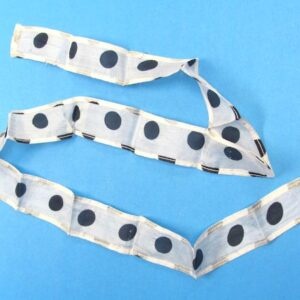 thumb tip streamer (black polka dots on white)