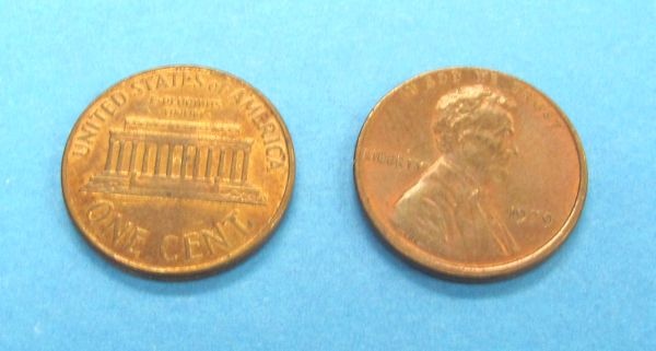 pair of double sided pennies