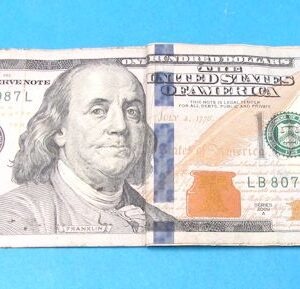 real one dollar bill to real 100 dollar bill (magnetic)