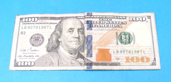 real one dollar bill to real 100 dollar bill (magnetic)